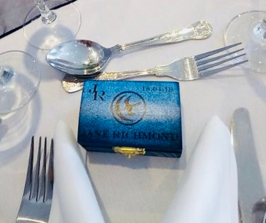 Personalised favour boxes and place setting
