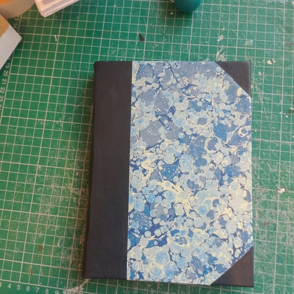 A5 Journal with tree free hemp paper, printed marbled cover and leather spine