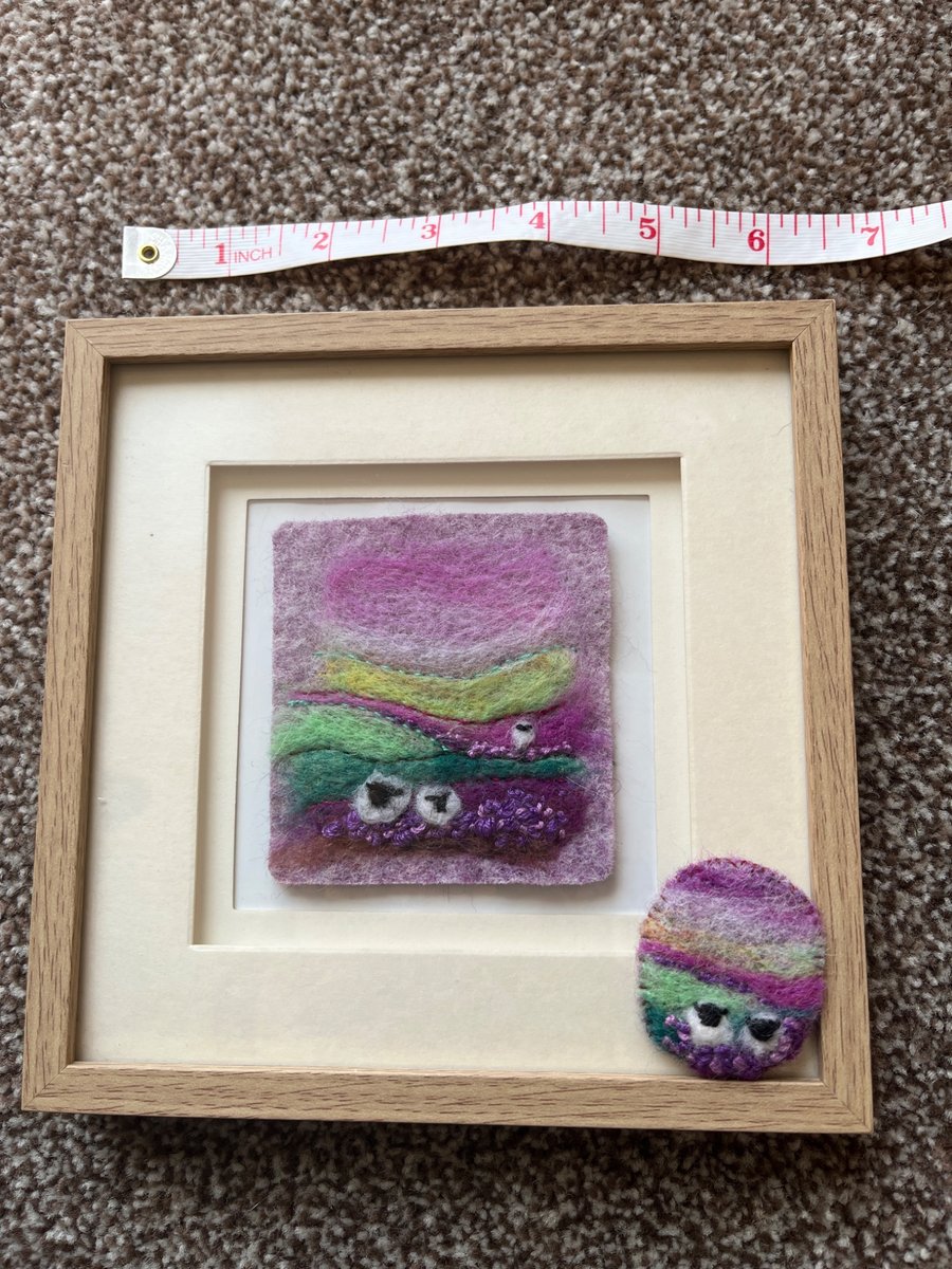 Needle felt picture and matching brooche moorland scene with sheep and heather 
