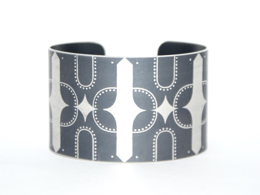 Geometric bird print aluminium cuff dark grey
