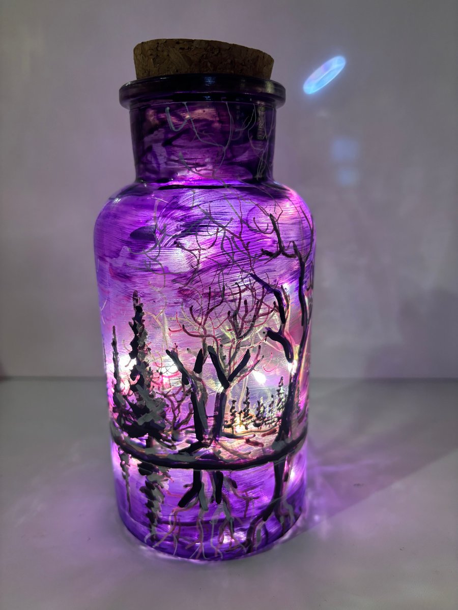 A hand painted and fired glass vase with lid by Andrew Jenkins 