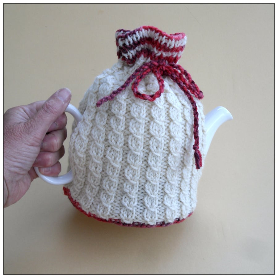Cream aran hand knit tea cosy