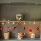 Crochet Garland of Small Bright Multicolour Flowers