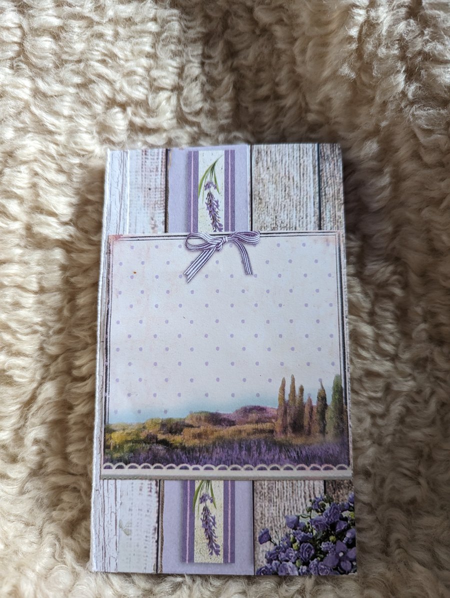 Small hard backed lilac notebook 