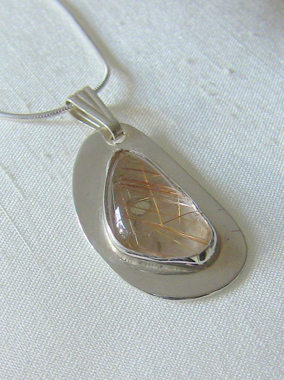 Sterling Silver Freeform Pendant with Rutilated Quartz Gemstone,