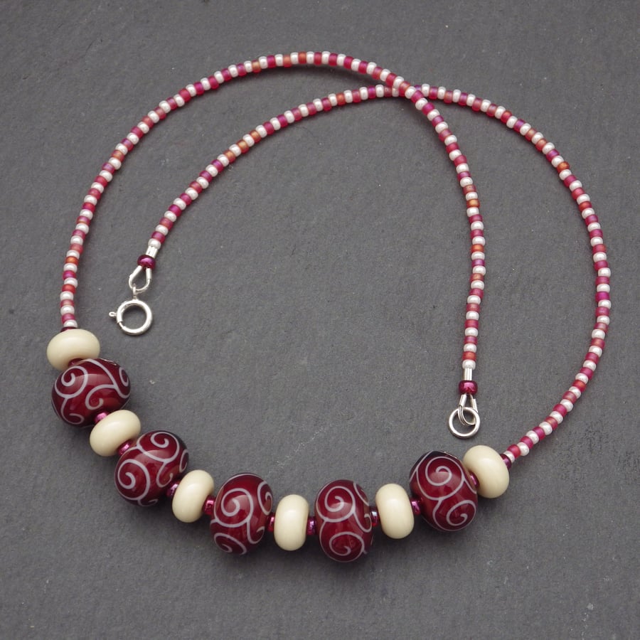 Deep red and ivory handmade lampwork glass bead necklace