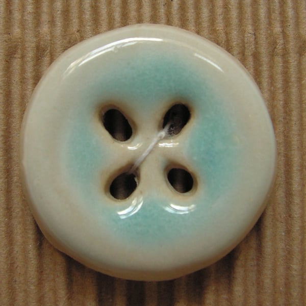 Set of 2 ceramic round blue and cream buttons