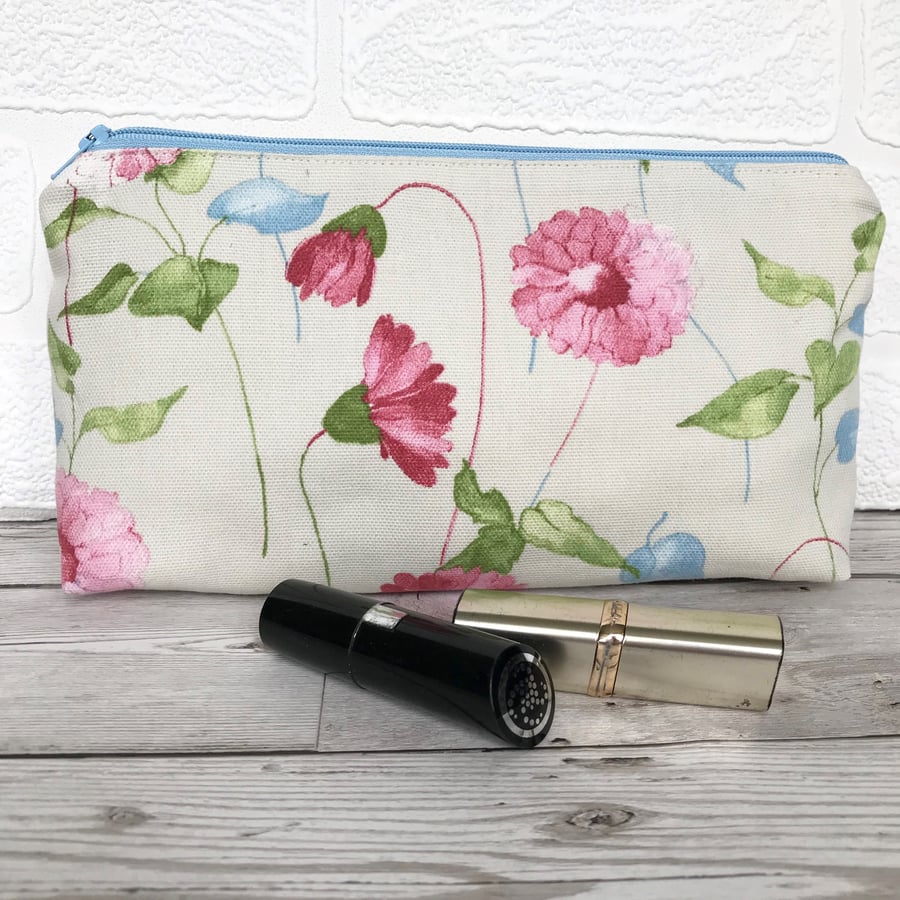 Cosmetic bag, make up bag in cream with pastel pink, blue and green floral print