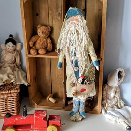 Handmade primitive santa with blue velvet trim