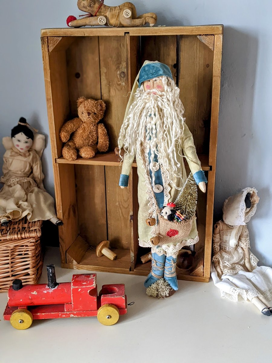 Handmade primitive santa with blue velvet trim