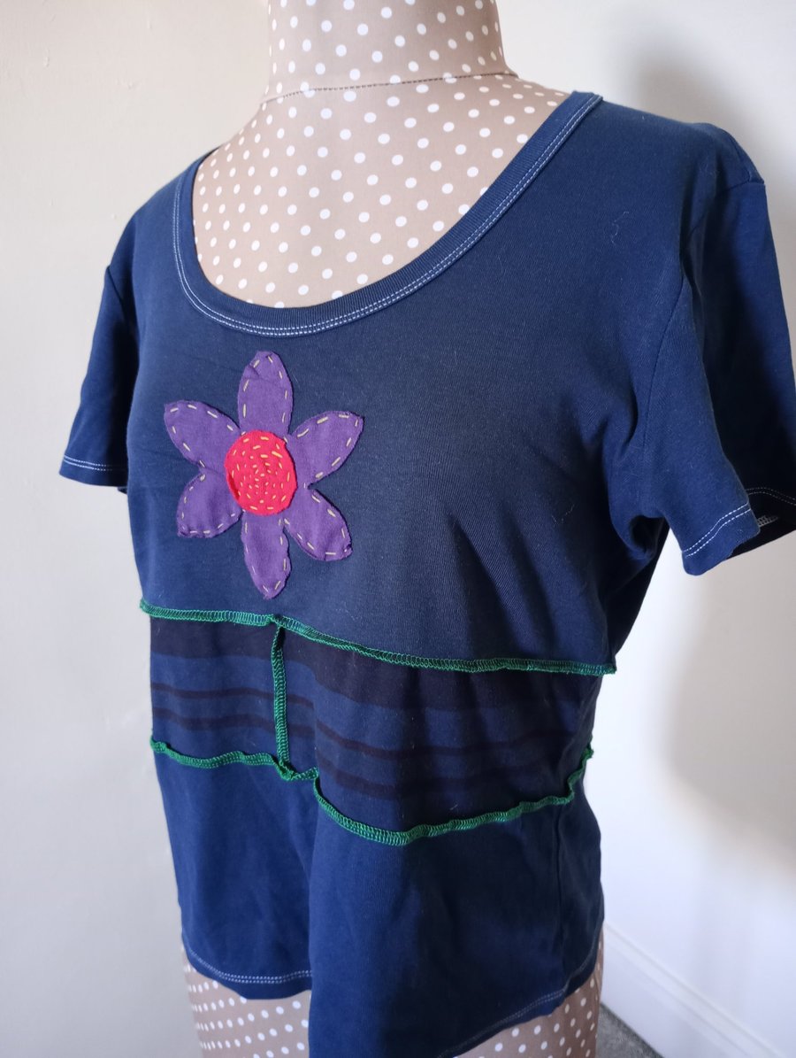 Black patchwork tee with flower applique