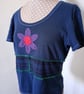 Black patchwork tee with flower applique