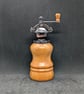 Antique copper pepper grinder with a lathe turned Brown Ivory wood body