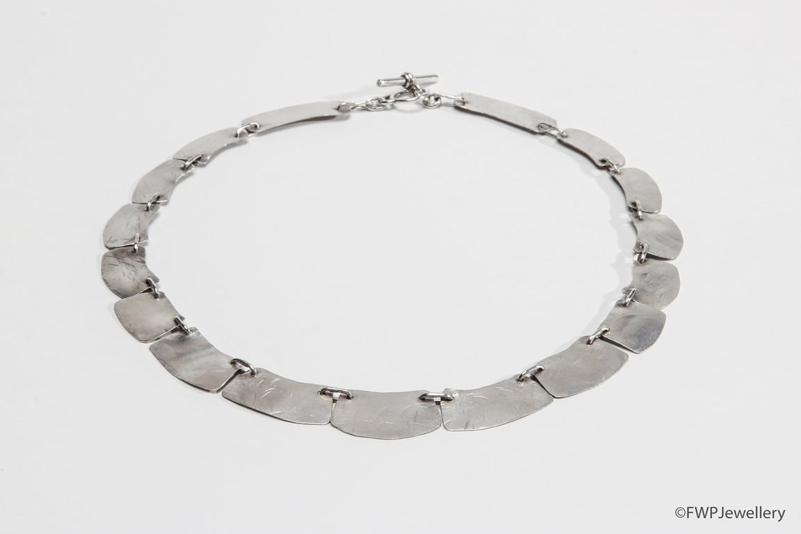 17 Linked Silver Units Necklace