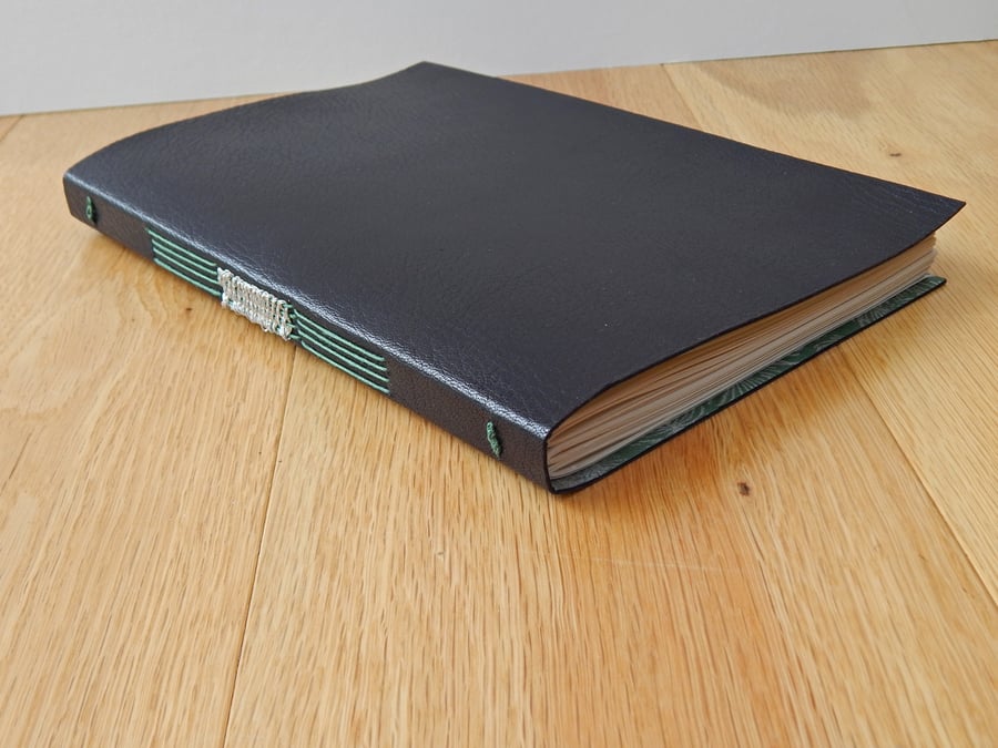 Black leather Journal with silver-woven stitching. Gifts for Men