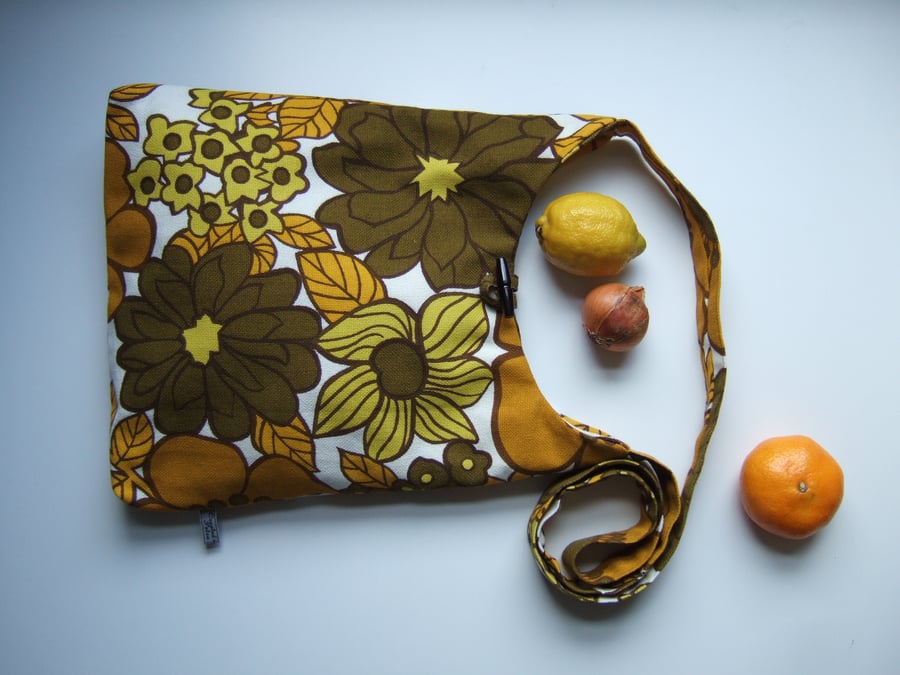 Bold 1970's vintage floral across your body bag or beach bag.