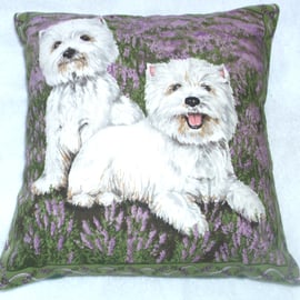 Two Westies side by side in the heather waiting for some fun cushion