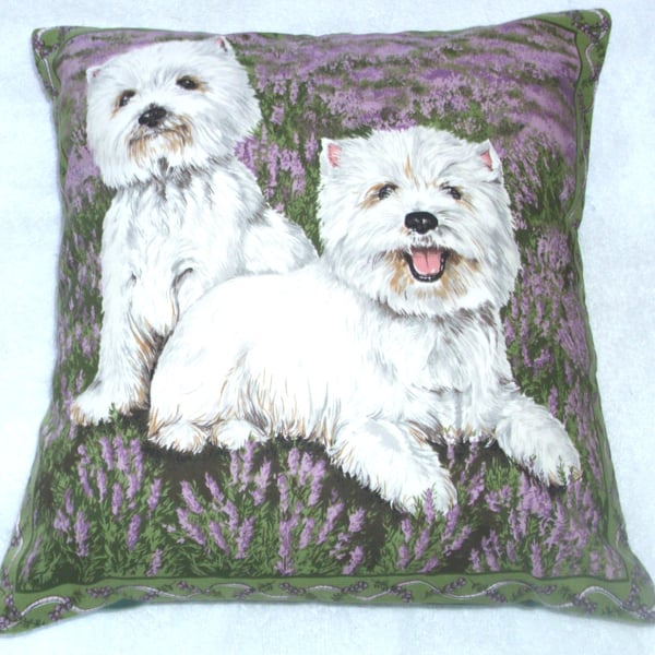 Two Westies side by side in the heather waiting for some fun cushion