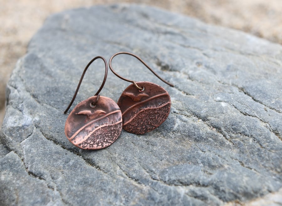 Pretty copper Lamorna seascape earrings on antique brass ear wires