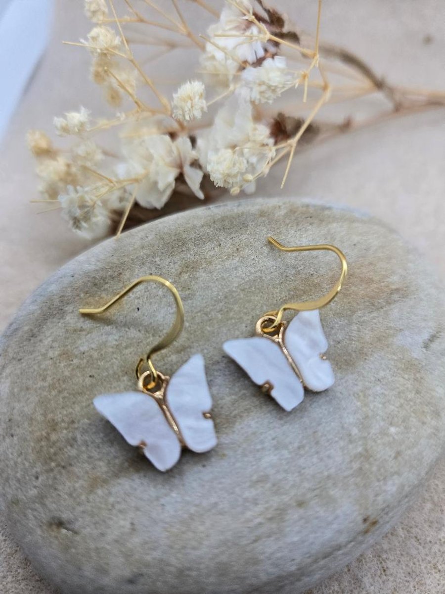 Handmade hypoallergenic gold plated earrings with white acrylic butterflies 