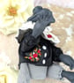 'Rospo', a black porcelain and textile frog imp. - Image 7