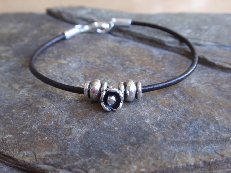 Dark brown leather stacking bracelet with silver tone flower 