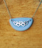 Blue beach glass pendant with multiple hearts - Image 1