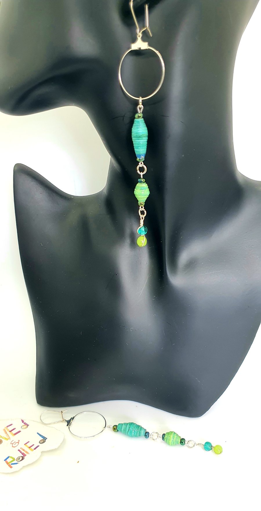 Long and light blue-green paper beaded earrings
