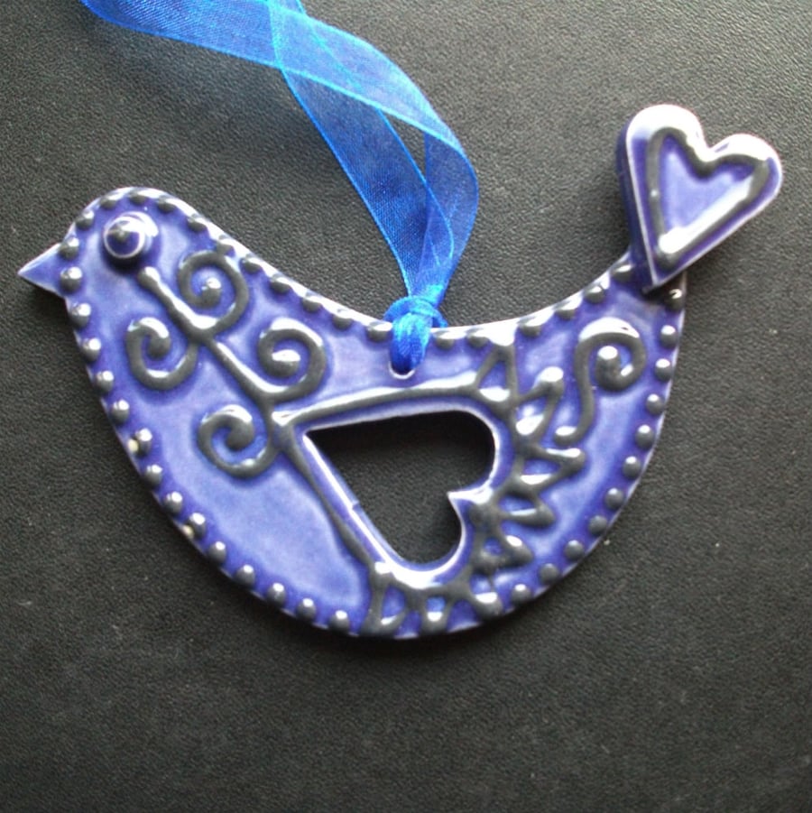 ceramic folk art purple bird decoration 