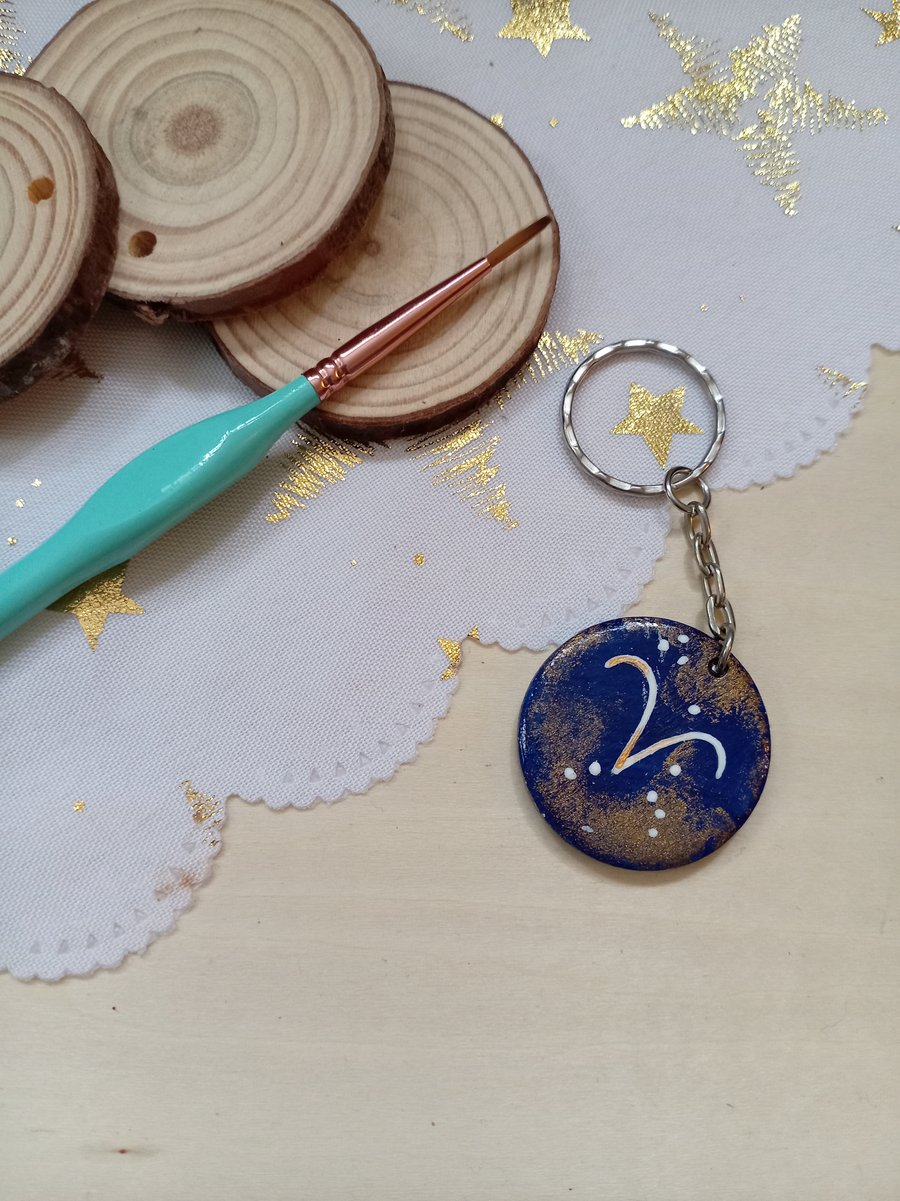 Wooden circular starsign aries keyring