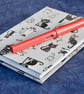 A6 Hardback Notebook with fun cat-covered fabric cover - Image 1
