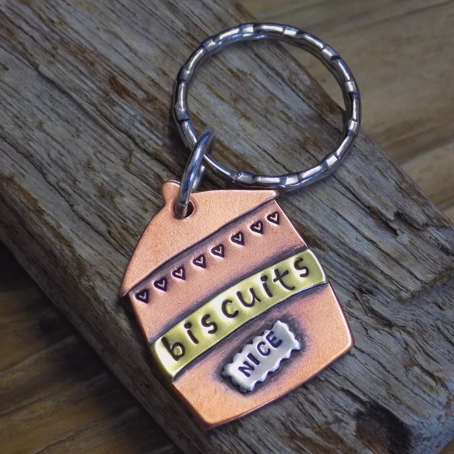 Copper, brass and silver biscuit tin keyring 