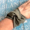 Twist style fabric bracelet cuff in dark khaki green tattoo cover up wrist