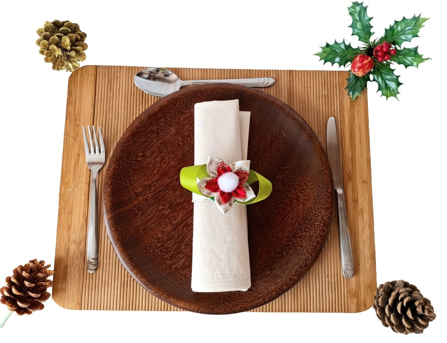 Set of six Christmas napkin rings and holders.