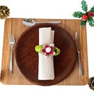 Set of six Christmas napkin rings and holders.
