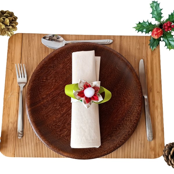 Set of six Christmas napkin rings and holders.