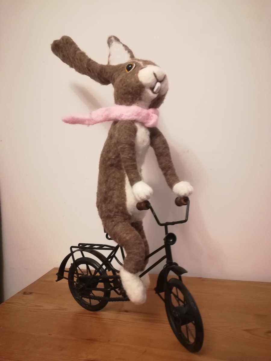 SOLD Hare needle felted wool sculpture riding bicycle hairy biker 