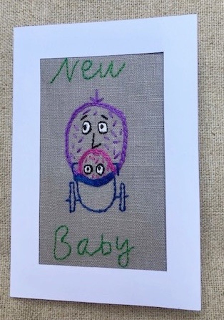 New baby character embroidered card.