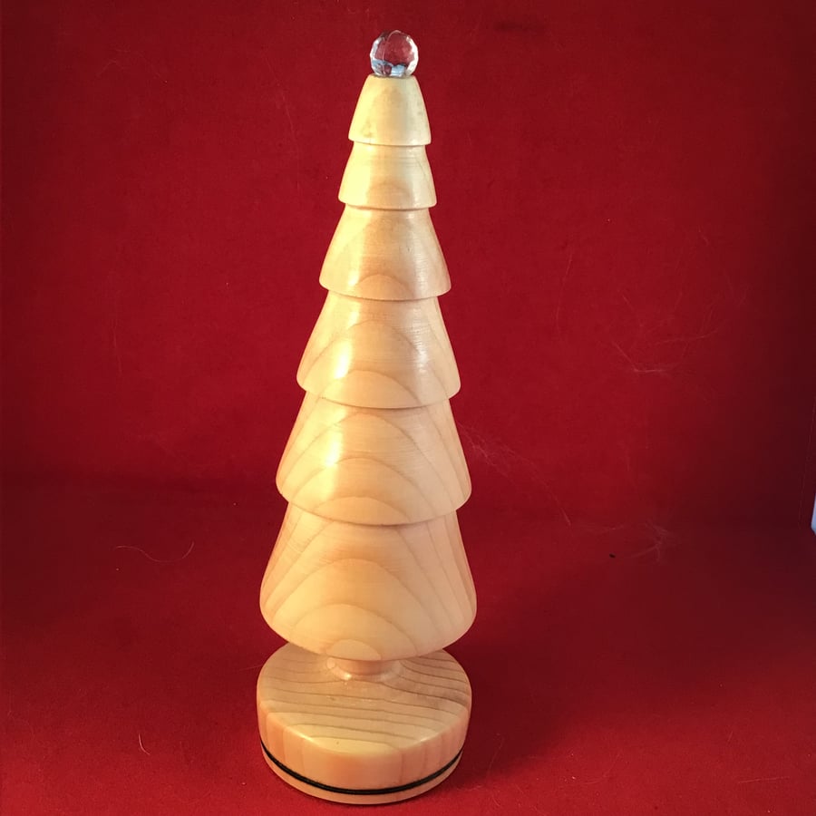 Natural wood Christmas tree.