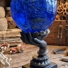 Rippled Blue Seer Ball on Hand Stand. Mystical Resin Sphere