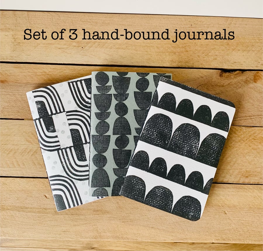 Set of 3 Hand Bound and Hand-printed Journals. Black, white and grey.