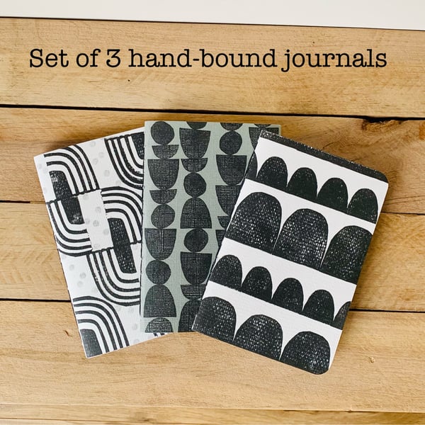 Set of 3 Hand Bound and Hand-printed Journals. Black, white and grey.