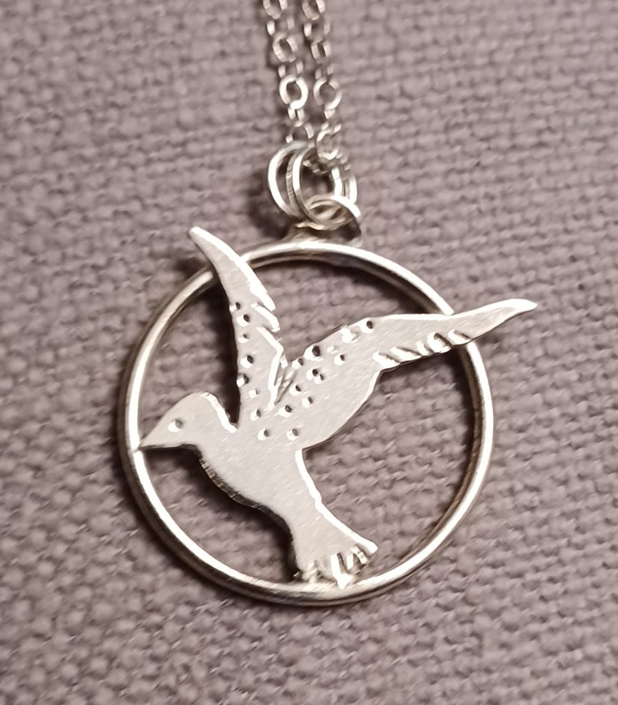 Image of Flying bird pendant
