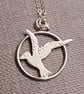Flying bird pendant