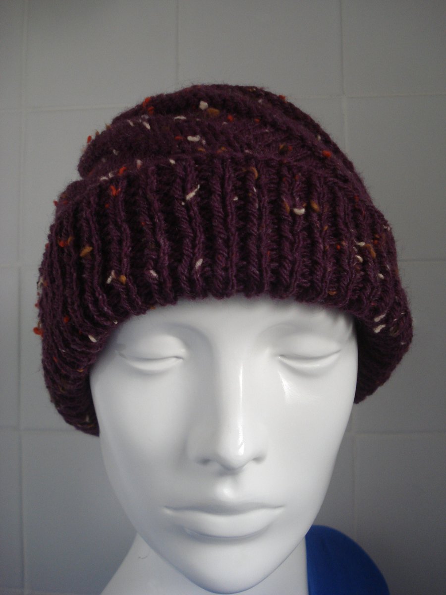 Hand Knitted Acrylic And Wool Plum Coloured Hat With A Twist (R777)