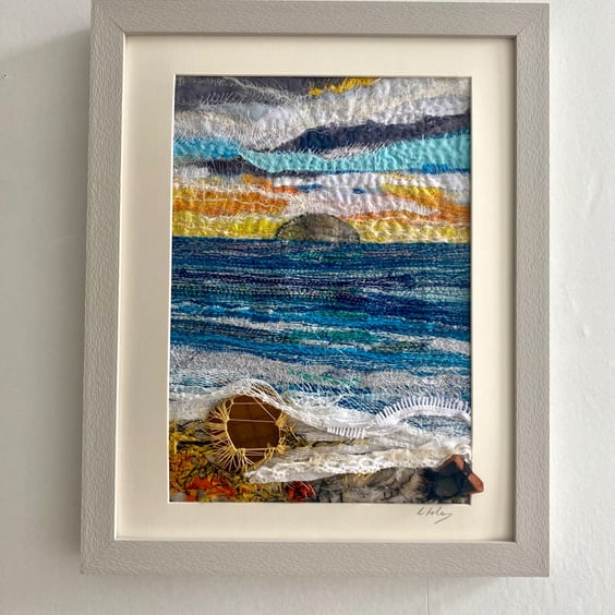 Sunset over the sea a framed textile seascape hanging