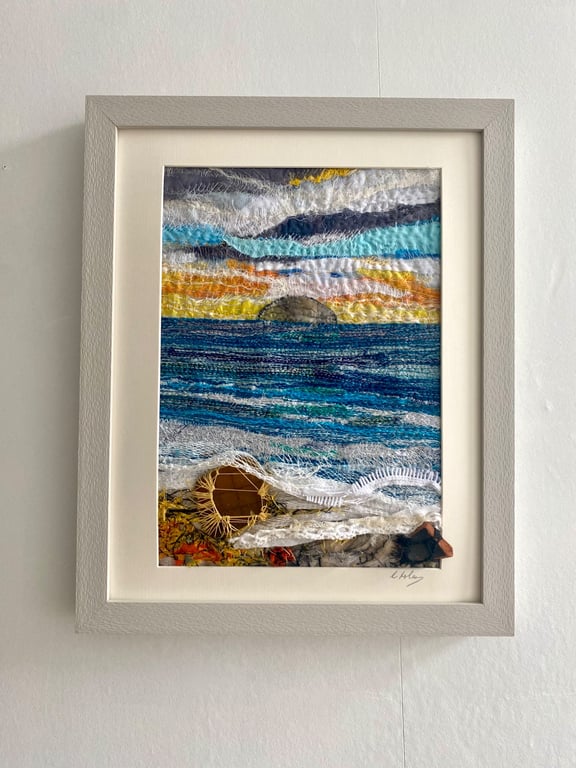 Sunset over the sea a framed textile seascape hanging