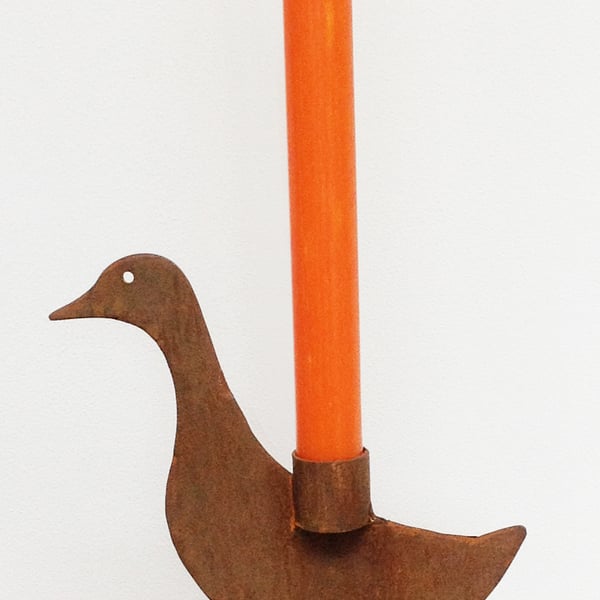 rusted sculptured metal duck candle holder