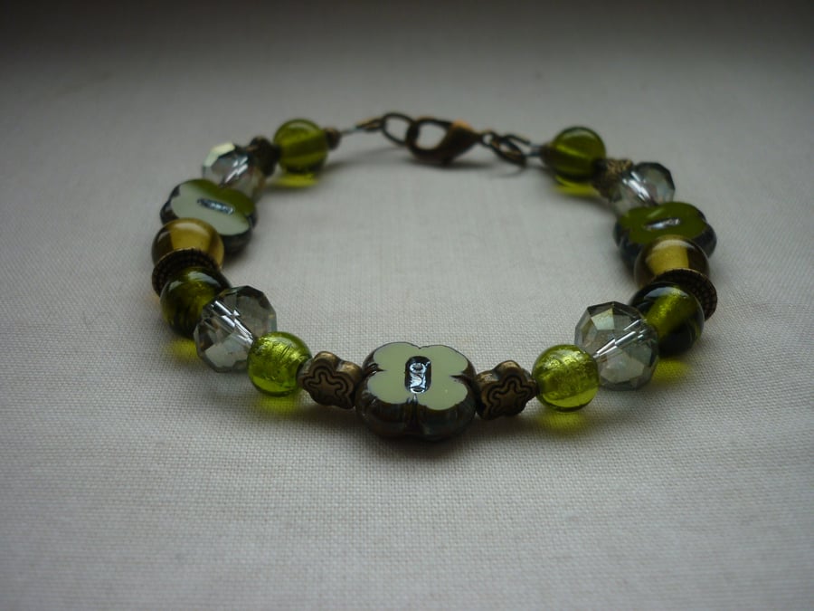 SHADES OF GREEN AND ANTIQUE BRONZE BRACELET.