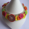 Neon yellow, pink, green, orange button bracelet